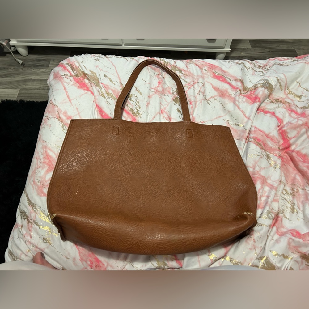 Brown exterior black interior, vegan leather handbag